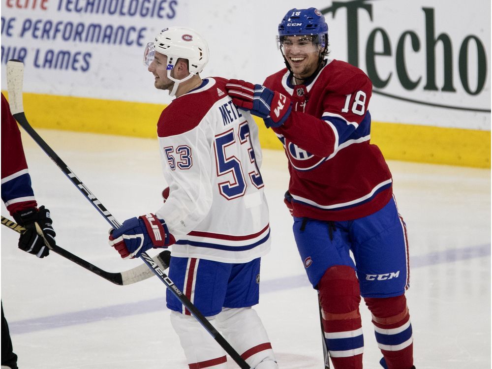 Formula One driver Lance Stroll celebrates with Victor Mete after scoring against Michael McNiven at the Bell Sports Complex in Brossard on Wednesday, June 5, 2019. 