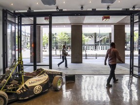 A moveable glass wall allows Concordia University's 4th SPACE to open the exhibition to the sidewalk outside the J.W. McConnell Building. The current exhibition is VROOM: Concordia Grand Prix Summer Garage, highlighting the work of the university's Society of Automotive Engineers.