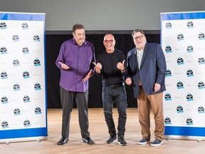 Comedian/coach Joey Elias, left, and judge/CHOM’s Terry DiMonte, right, share laughs with headliner Howie Mandel at the St. Raphael Palliative Care Home and Day Centre’s Humour Me fundraiser.