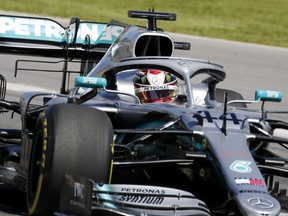 Lewis Hamilton guides his Mercedes around Circuit Gilles-Villeneuve during second practice session in Montreal on Friday, June 7, 2019.