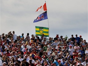 Fans watch the qualifying rounds at the Canadian Grand Prix at the Circuit Gilles Villeneuve in Montreal on Saturday, June 8, 2019.
