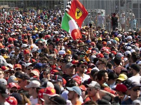 Ferrari fans fill the start line, many booing Mercedes driver Lewis Hamilton after he won his seventh Canadian Grand Prix at Circuit Gilles-Villeneuve in Montreal on Sunday, June 9, 2019.