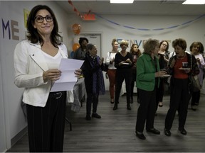 Allison Cobrin, left, meets guests during the recent opening of the West Island branch of the Alzheimer Groupe.