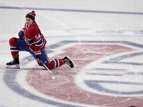 The Canadiens' Charles Hudon takes a break during team's skills competition at the Bell Centre in Montreal on Jan. 20, 2019.