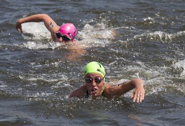 MONTREAL, QUE.: JUNE 29, 2019 -- Competitors in the Women ITU World Triathlon Series take part in a 750-metre swim in the Alexandra Basin at the Montreal International Triathlon in the Old Montreal area of Montreal Friday, June 28, 2019. Race winner Katie Zaferes of the U.S.A. finished the 750-metre swim, 20-kilometre cycle and five-kilometre run in 58 minutes 15 seconds for her fourth victory of the season. (John Kenney / MONTREAL GAZETTE) ORG XMIT: 62767