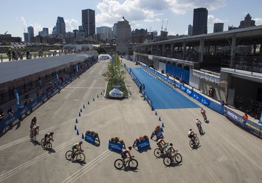 MONTREAL, QUE.: JUNE 29, 2019 -- Competitors in the Women ITU World Triathlon Series take part in a 20-kilometre cycling leg at the Montreal International Triathlon in the Old Montreal area of Montreal Friday, June 28, 2019. Race winner Katie Zaferes of the U.S.A. finished the 750-metre swim, 20-kilometre cycle and five-kilometre run in 58 minutes 15 seconds for her fourth victory of the season. (John Kenney / MONTREAL GAZETTE) ORG XMIT: 62767