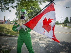 Dressed in the Power Ranger outfit, Gerry Osei-Agyemang celebrates Canada Day in Pierrefonds in 2018.