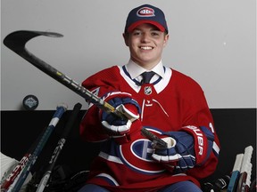 Cole Caufield poses for a portrait after being selected 15th overall by the Montreal Canadiens during the first round of the 2019 NHL Draft at Rogers Arena on June 21, 2019, in Vancouver.