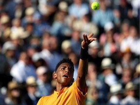 Montreal's Félix Auger-Aliassime serves during Fever-Tree Championships semifinal against Feliciano Lopez of Spain on June 22, 2019 in London.