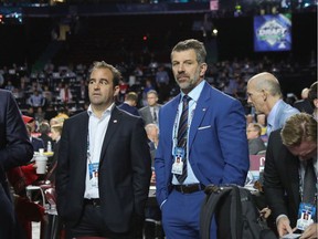 VANCOUVER, BRITISH COLUMBIA - JUNE 22: (L-R) Geoff Molson and Marc Bergevin of the Montreal Canadiens attend the 2019 NHL Draft at Rogers Arena on June 22, 2019 in Vancouver, Canada.
