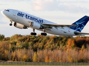 An Air Transat flight takes off from Trudeau airport in Montreal in 2010.