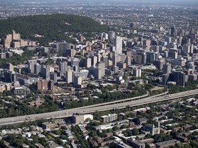 MONTREAL, QUE.: JULY 19, 2018-- The skyline of Montreal as seen from just west of Atwater Ave. is seen in an aerial view in Montreal on Thursday July 19, 2018.