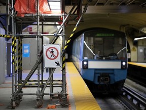 An STM train arrives at the unfinished platform of the Beaudry Metro station in Montreal, on Monday, June 3, 2019.