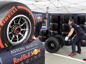 MONTREAL, QUE.: June 5, 2019 -- Red Bull Racing team members prepare tires at the Circuit Gilles Villeneuve in Montreal, on Wednesday, June 5, 2019. (Allen McInnis / MONTREAL GAZETTE) ORG XMIT: 62661