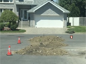 A pile of dirt is seen at Shakespeare and Garland Sts. in Dollard-des-Ormeaux in this photo provided by the city. It was dumped in the road overnight June 21-22, 2019. The city is looking to find whoever dumped the dirt here and at other places in the city.