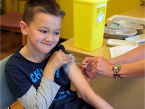 A child in Wales receives an MMR vaccination.