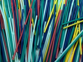 (FILES) This file photo taken on August 12, 2018 shows plastic straws, in a studio, in Paris. - The European Union adopted emblematic reforms throughout the outgoing legislature's five-year term, like the EU-wide ban on single-use plastic products or the end of the "roaming" or copyright reform.