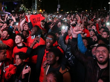 Fans celebrate their win in Game 6 of the NBA basketball finals between the Toronto Raptors and the Golden State Warriors in Montreal, June 13, 2019.