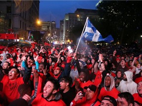 Fans watch Game 6 of the NBA basketball finals between the Toronto Raptors and the Golden State Warriors in Montreal, June 13, 2019.