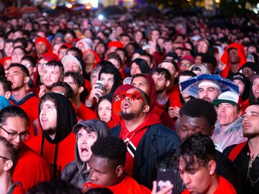 Fans watch Game 6 of the NBA basketball finals between the Toronto Raptors and the Golden State Warriors in Montreal, June 13, 2019.