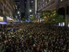 Fans watch Game 5 of the NBA Finals between the Toronto Raptors and the Golden State Warriors at a viewing party in Montreal on Monday, June 10, 2019.