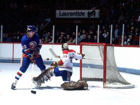 Canadiens goaltender Richard Sevigny denies Islanders' Mike Bossy from close range. Bossy is one of three NHL Hall of Famers who was selected with the No. 15 pick of the draft, the same position Montreal holds for this year's edition.