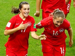 Canada's Jessie Fleming celebrates with teammates after scoring her first goal against New Zealand in a 2019 FIFA Women's World Cup Group E game at the Stade des Alpes in Grenoble France on Saturday, June 15, 2019.