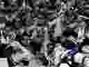 St. Louis Blues players pose for a team photo with the Stanley Cup after defeating the Boston Bruins in game seven of the 2019 Stanley Cup Final at TD Garden.