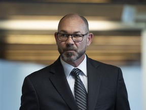 Colonel Mario Dutil returns to the courtroom after a break during his court martial at the Asticou Centre in Gatineau, Que., Monday, June 10, 2019.