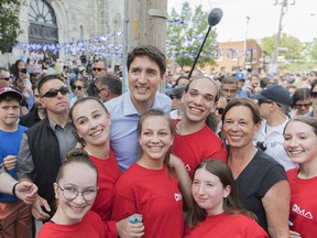 Prime Minister Justin Trudeau greets supporters during Fête nationale celebrations in Montreal, Monday, June 24, 2019.