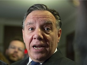 CP-Web. Quebec Premier Francois Legault responds to reporters questions over his meeting with Alberta Premier Jason Kenney, Wednesday, June 12, 2019 at the legislature in Quebec City.