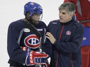 Assistant coach J.J. Daigneault talks with defenceman P.K. Subban during Canadiens practice at the Bell Sports Complex in Brossard on March 13, 2015.