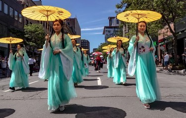 Montrealers of all backgrounds took part in the Canada Day Parade in Montreal on Monday July 1, 2019.
