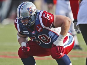 Alouettes guard Luc Brodeur-Jourdain sets up on the offensive line during CFL game against the Calgary Stampeders at Molson Stadium in Montreal on Oct. 12, 2009.