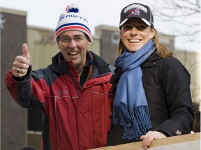 Former Alouette Tony Proudfoot gives a thumbs-up with daughter Lindsay during the team's Grey Cup victory parade on Ste-Catherine St. in 2009. Proudfoot died in 2010 from ALS, only three years after it was diagnosed.
