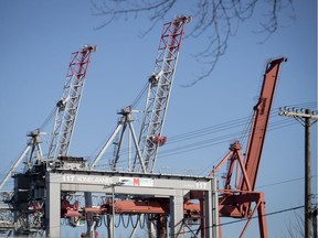 Container cranes remain idle in the Port of Montreal in 2019.