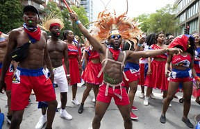 Carifiesta dancers on a downtown street