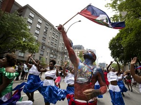 Dancers from Montreal’s Haitian community take part in the 44th annual Carifiesta in Montreal, on Saturday, July 6, 2019.