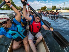 "I fell in love with it on Day One," says Power of the Dragon team captain Isabel Pereira, left, with Pierrette Hebert on the Lachine Canal, "and I have developed so many good friendships."