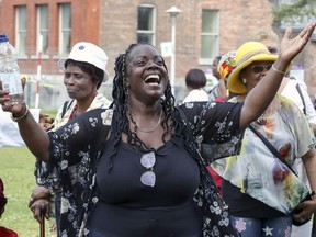 Deborah Maighan dances to the music of a live band during the Spice Island Cultural Day at Vinet Park in Montreal on Saturday, July 13, 2019.