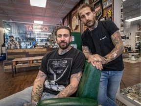 "Any person, no matter where they rank themselves in society, can fit in," says Dave Lechasseur, left, seen with Mikey Rose at their Savvy Barber & Tattoo shop on Wednesday, July 17, 2019.