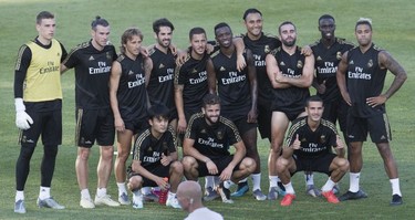 MONTREAL, QUE.: JULY 17, 2019 -- The winning side in a mini-match between Real Madrid CF players pose for a photo as the soccer team practiced at Saputo stadium in Montreal July 17, 2019. The storied Spanish team is practicing in Montreal from July 9-19 in preparation for the International Champions Cup. (John Kenney / MONTREAL GAZETTE) ORG XMIT: 62866