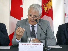 Federal transport minister Marc Garneau answers reporter's question at ground-breaking ceremony for construction of the REM station at Trudeau Airport in Dorval, west of Montreal Friday July 19, 2019.