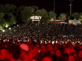 Fans watch Slayer perform during the second day of the 2014 Heavy Montréal festival.