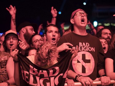 Fans listen to the show by the band Bad Religion at the '77 Montréal punk festival at Parc Jean-Drapeau in Montreal Friday, July 26, 2019.