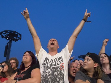 Fans enjoy the band Pennywise at the '77 Montréal punk festival at Parc Jean-Drapeau in Montreal Friday, July 26, 2019.
