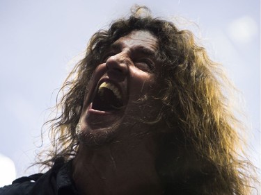 Bassist Frank Bello of Anthrax gives a yell.