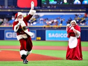 What does Santa do in the off season? Play ball and camp, obviously.