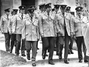 Prison guards in Ste-Anne-des-Plaines on July 29, 1982, at the funeral of three guards murdered during a prison riot at Archambault Institute on July 25, 1982.