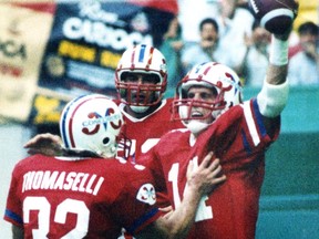 Rich Thomaselli, Nick Arakgi (centre) and Mike McTague celebrate a touchdown by the Montreal Concordes on July 4, 1985. They defeated the Winnipeg Blue Bombers 34-18 in their season opener. The uncropped version of the photo is embedded in the story.